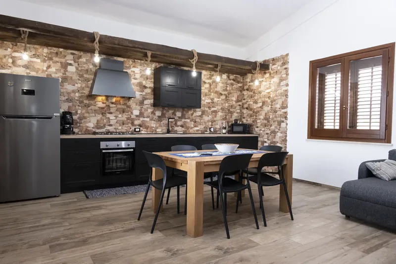 Kitchen with an island and dining area
