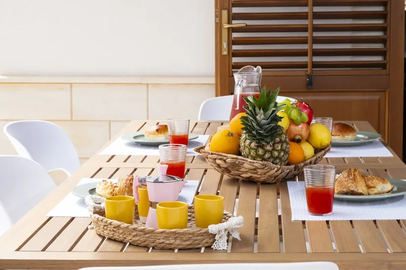 Terrace breakfast table looking out to Monte Cofano